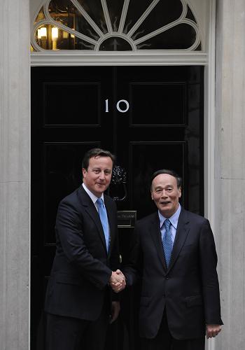 何立峰与英国财政大臣里夫斯共同主持第十一次中英经济财金对话